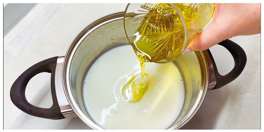 Pour olive oil into milk. I no longer buy it from the store. Easy and quick.